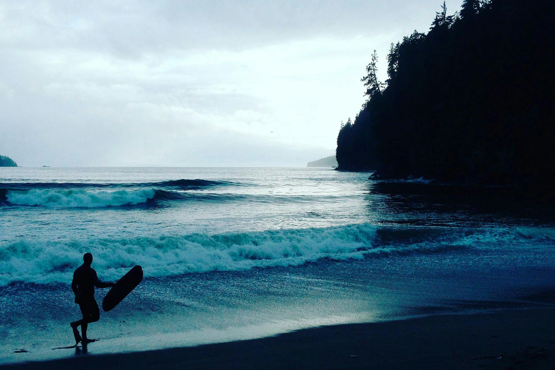 Graham Gidden. One last wave, on the shores of Vancouver Island. Photographed by Willy McB.