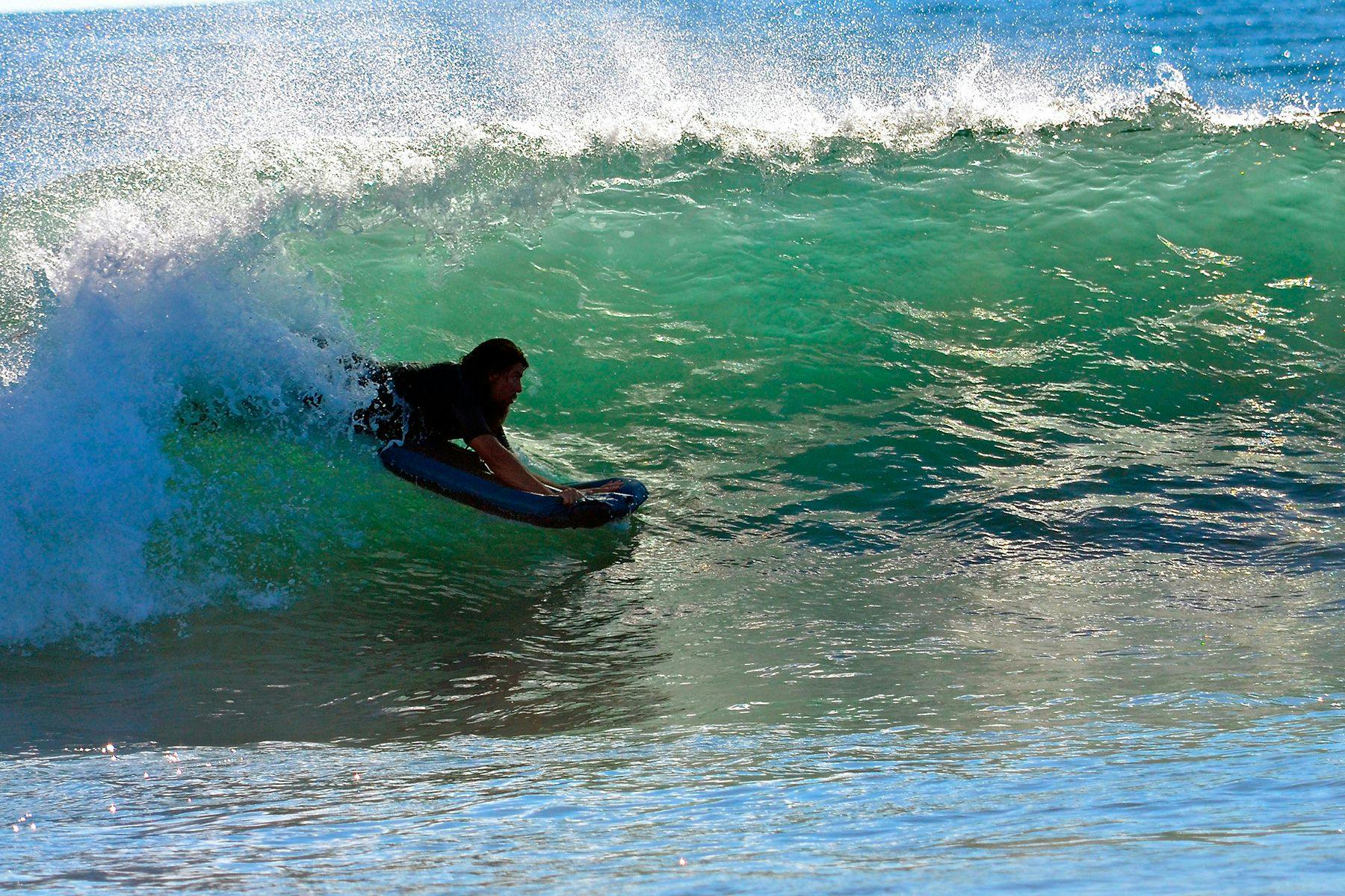 Matt Pierce getting barrelled on his mat in California. Photographed by Margarita Rosenberg.