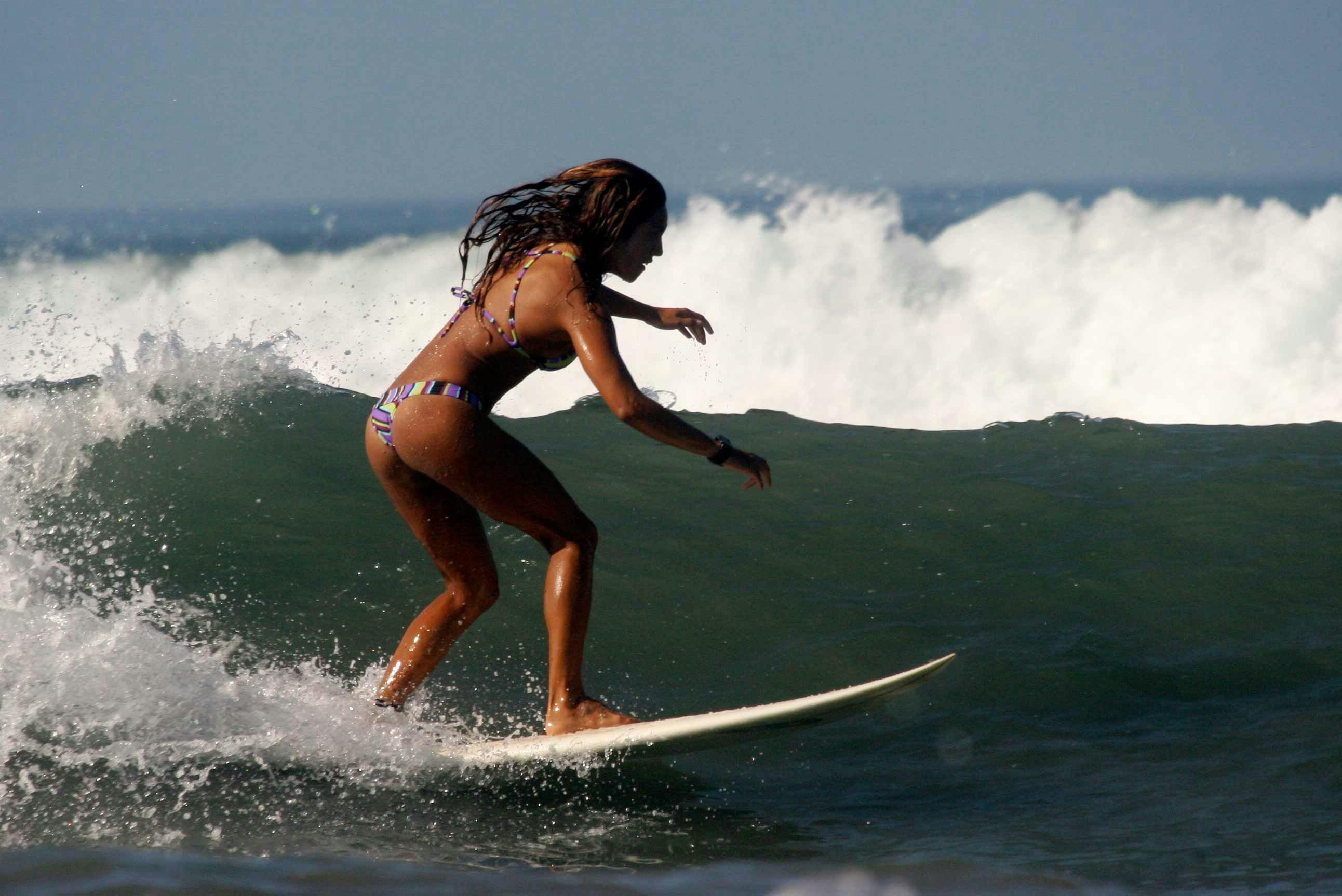 Surf Simply coach, Francela Gonzarlez still charging everyday on her short board during the first trimester. Photo by Graham Swindell